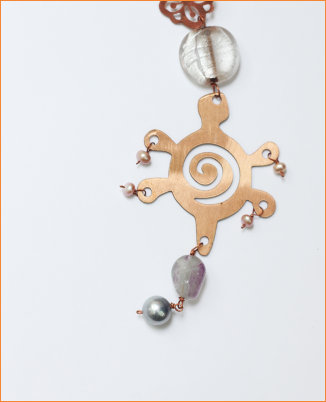 Copper motif and white beads